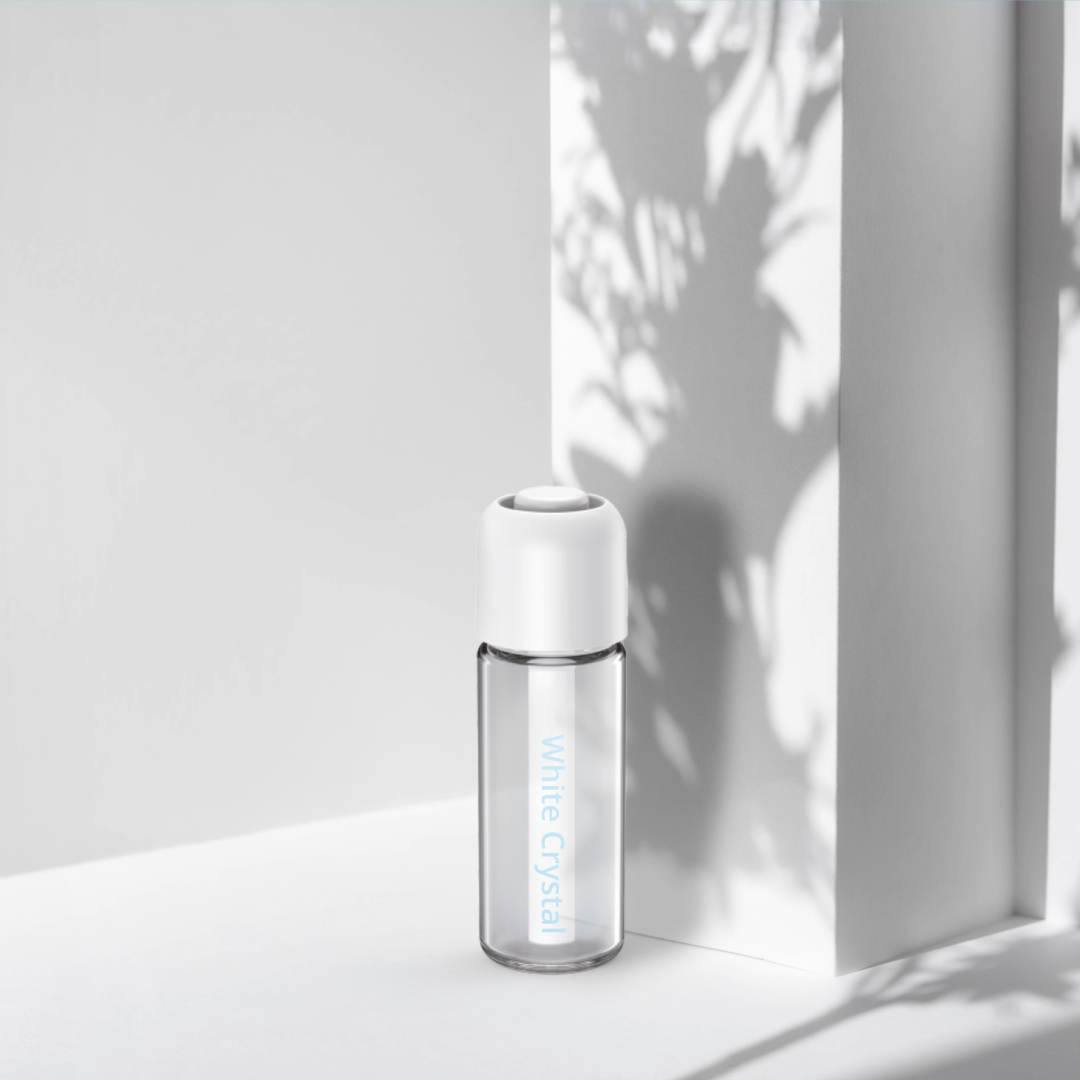 White Crystal refill fragrance bottle for Capsule 33 in soft daylight