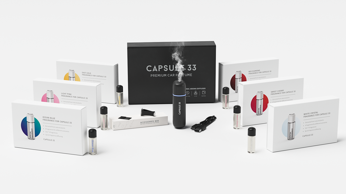 Capsule 33 car perfume starter pack laid out with the white diffuser and refill fragrance boxes