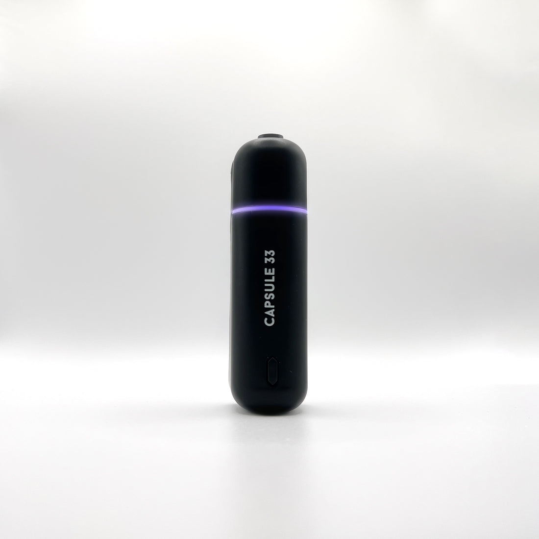 Capsule 33 smart car diffuser standing upright in black with the LED ring