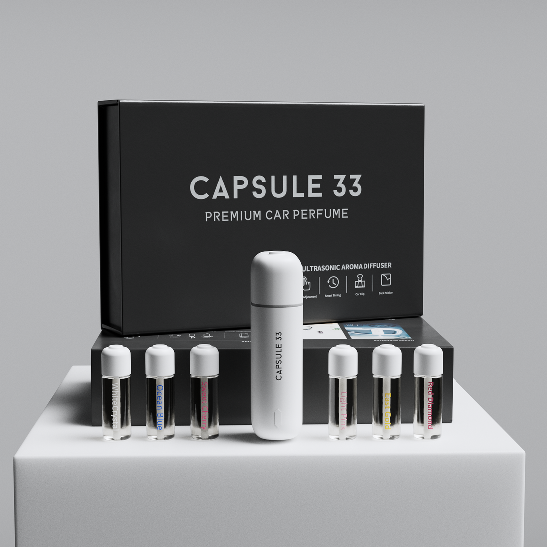 Capsule 33 car perfume starter pack displayed with the white diffuser and six refill bottles